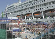 the main stadium with a cruise ship alongside